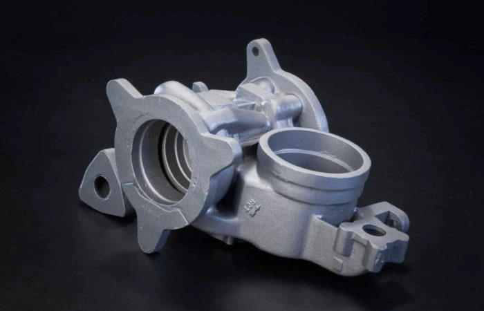 Detail photo showing a complex aluminum casting produced by Thompson Aluminum Casting